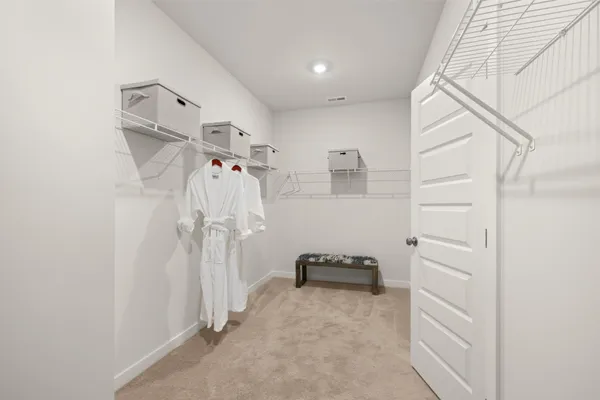 a bathroom with a toilet a sink and a bathtub