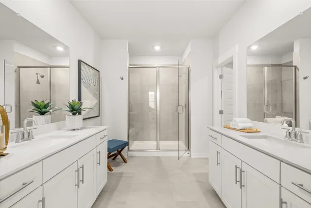 a bedroom with a bed and lamp