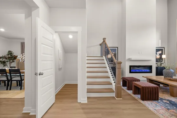 a bathroom with a granite countertop sink and a large mirror