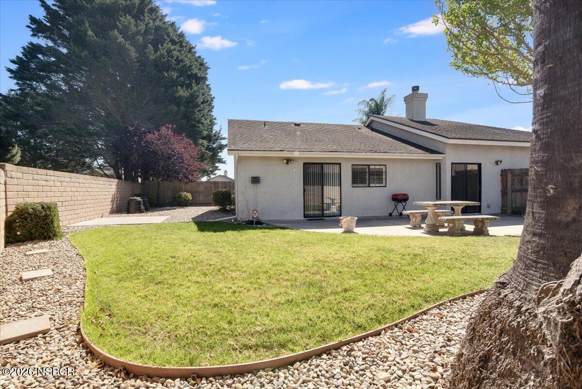 933 Bellflower Lane Lompoc, CA 93436 - Photo 16 of 17 a view of a house with swimming pool