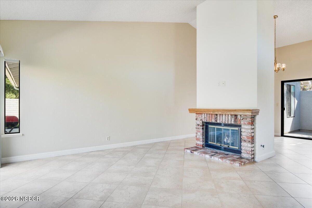 933 Bellflower Lane Lompoc, CA 93436 - Photo 4 of 17 a room with a fireplace
