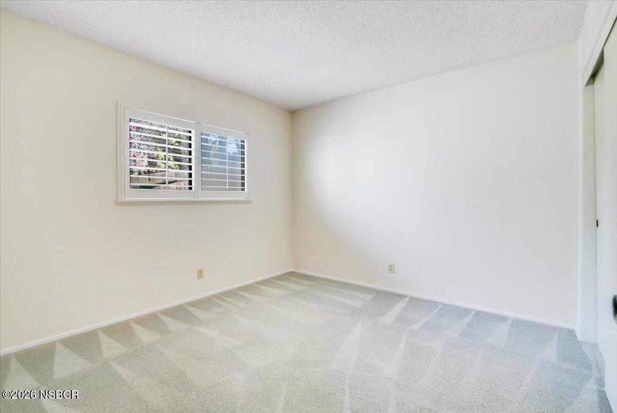 933 Bellflower Lane Lompoc, CA 93436 - Photo 9 of 17 an empty room with a window