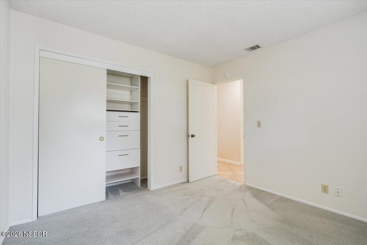 933 Bellflower Lane Lompoc, CA 93436 - Photo 10 of 17 an empty room with closet