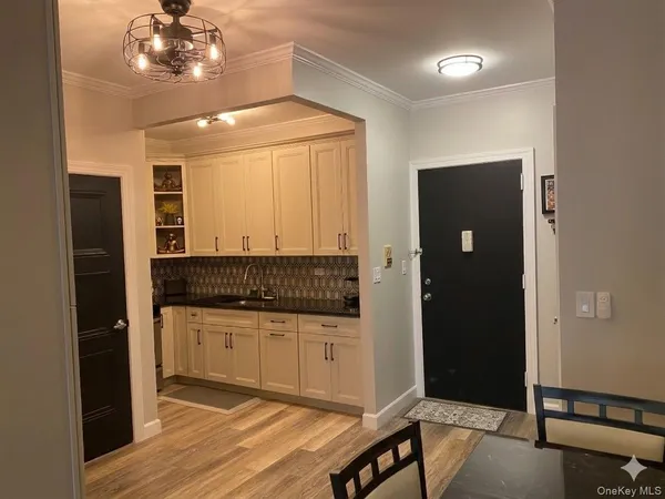 wooden floor in an empty room with a mirror