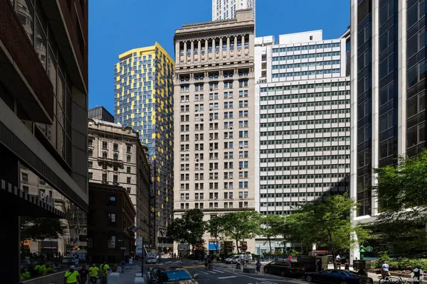 a front view of a building with street view