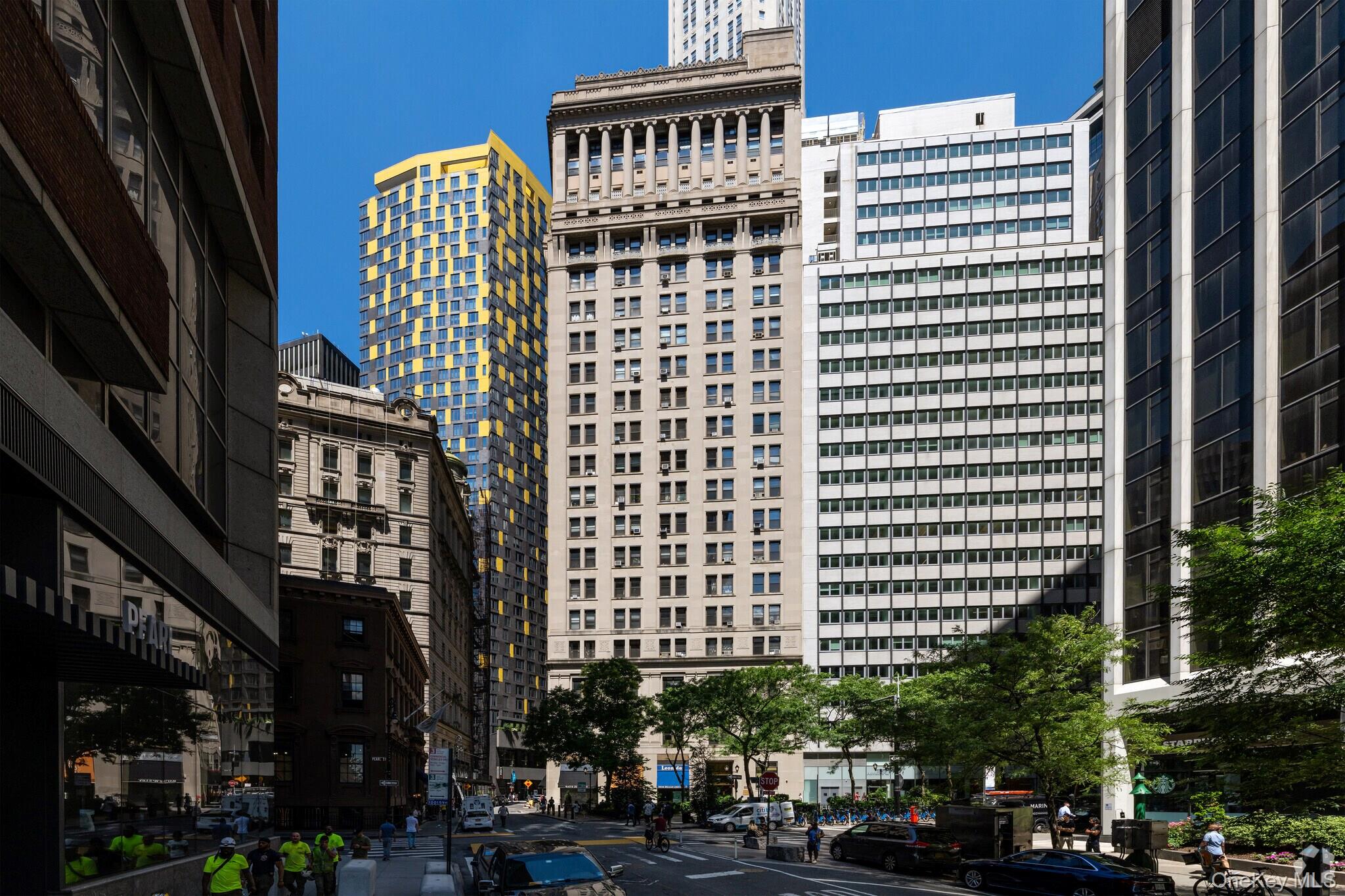 3 Hanover Square, Unit 12B Manhattan, NY 10004 - Photo 8 of 8 a front view of a building with street view