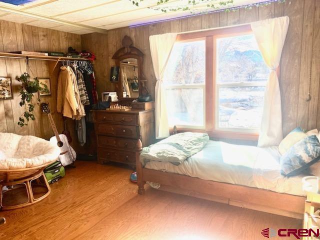 485 Florida Road, Unit B10 Durango, CO 81301 - Photo 11 of 19 a bedroom with a bed and a window