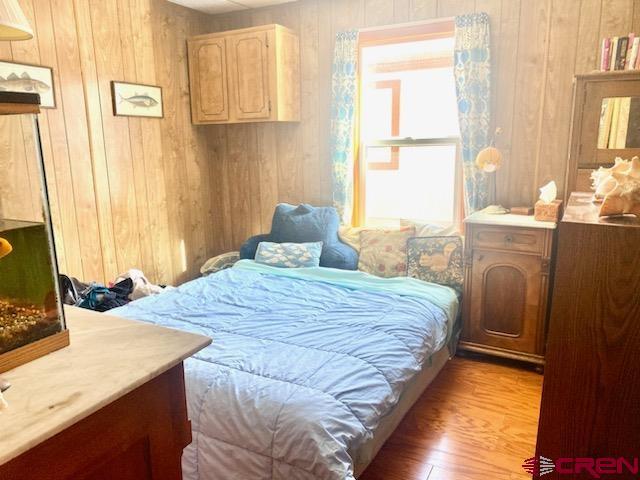 485 Florida Road, Unit B10 Durango, CO 81301 - Photo 14 of 19 a bedroom with a bed and a window