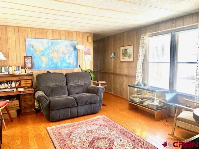485 Florida Road, Unit B10 Durango, CO 81301 - Photo 7 of 19 a living room with furniture and a large window