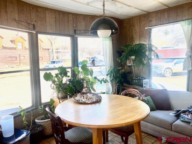 485 Florida Road, Unit B10 Durango, CO 81301 - Photo 10 of 19 a view of a dining room with furniture window and outside view