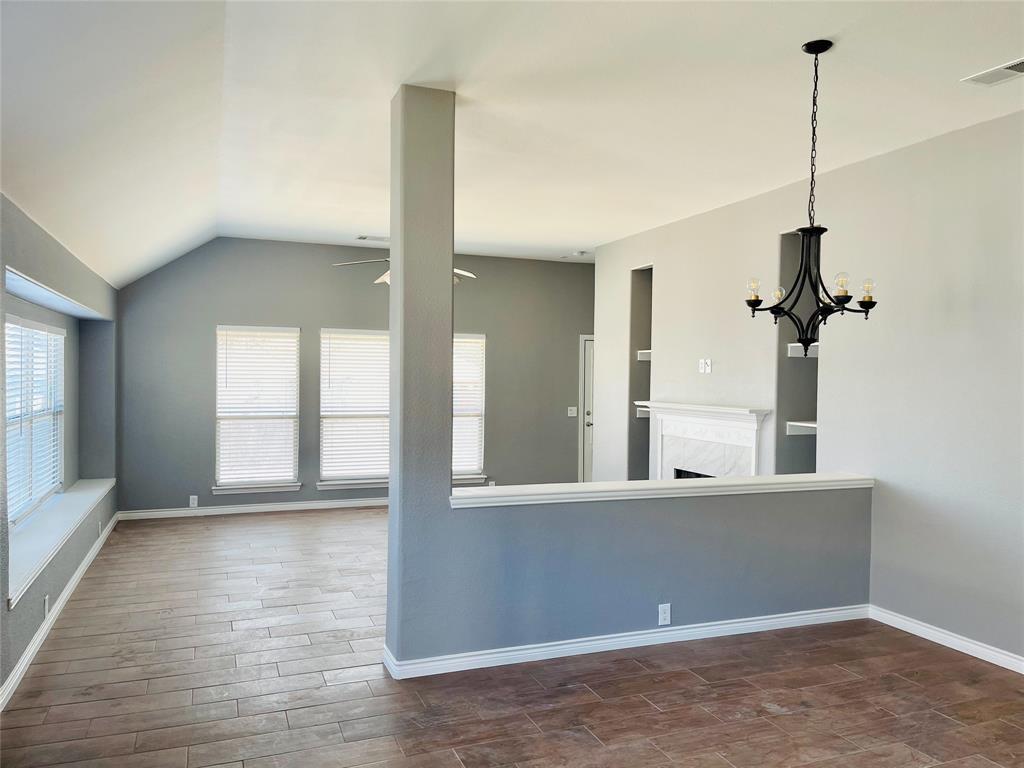 548 Kerry Street Crowley, TX 76036 - Photo 16 of 35 a view of an empty room with a window