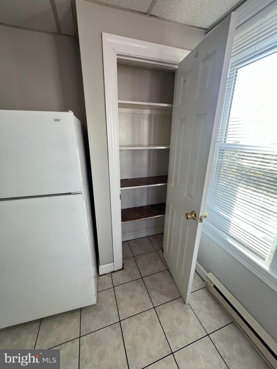 107 North York Street, Unit 3 Pottstown, PA 19464 - Photo 6 of 13 a view of walk in closet with empty racks