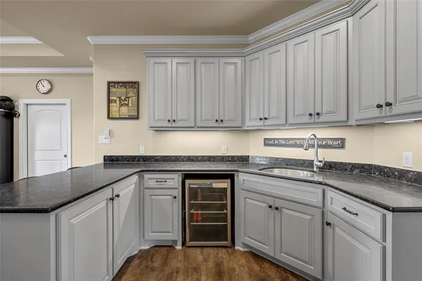a view of a livingroom with furniture and a chandelier