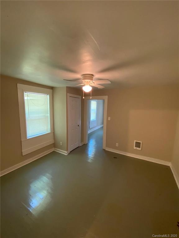 145 Lore Street Southwest Concord, NC 28025 - Photo 9 of 9 a view of an empty room with a window