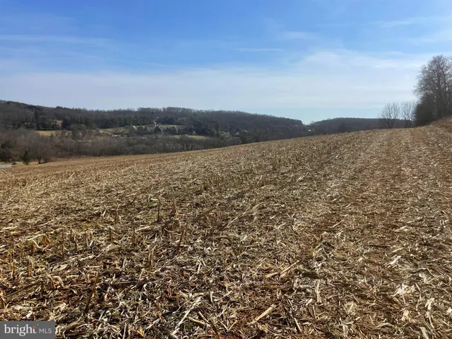 a view of lake with mountain