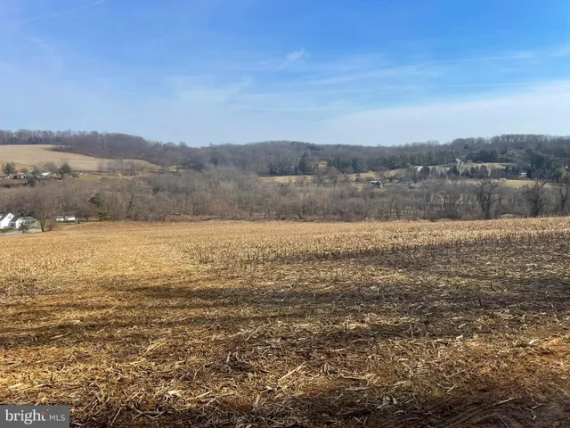 a view of ocean and mountains