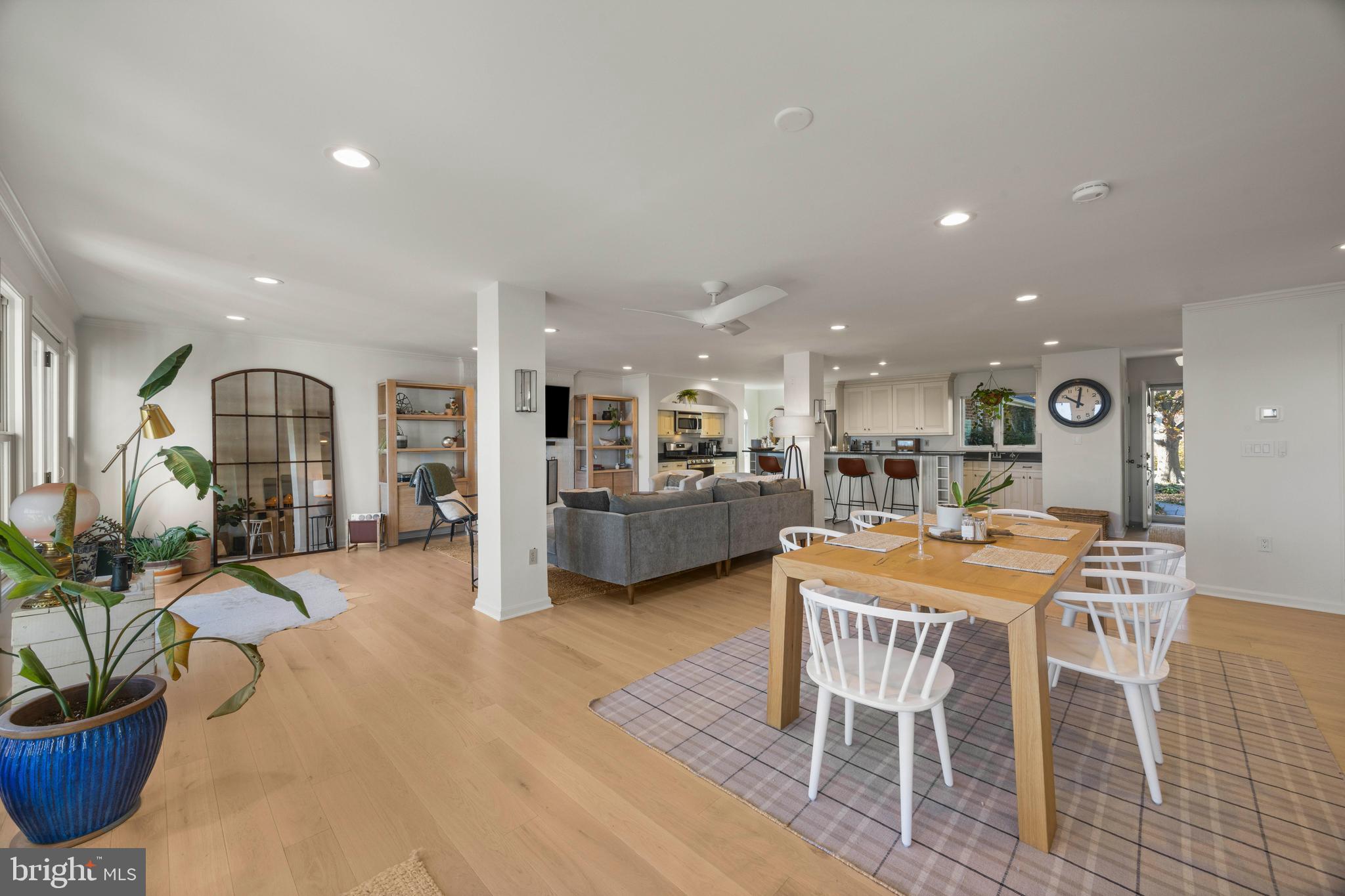 806 Monroe Manor Road Stevensville, MD 21619 - Photo 41 of 41 a dining hall with stainless steel appliances kitchen island granite countertop a dining table chairs and view kitchen