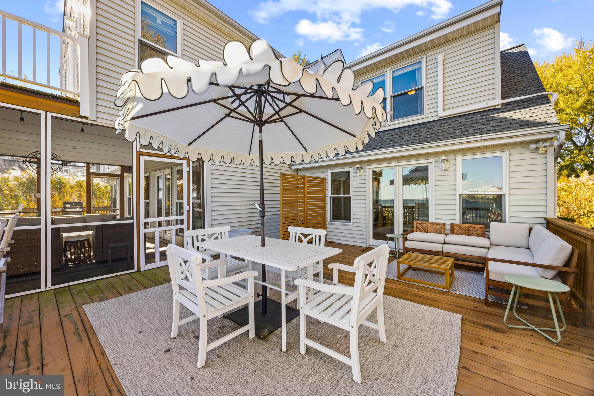 806 Monroe Manor Road Stevensville, MD 21619 - Photo 19 of 41 a view of a patio with a table and chairs
