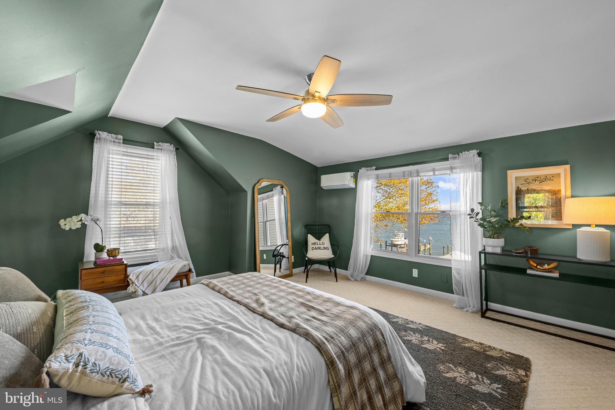 806 Monroe Manor Road Stevensville, MD 21619 - Photo 25 of 41 a bedroom with a bed and a large window