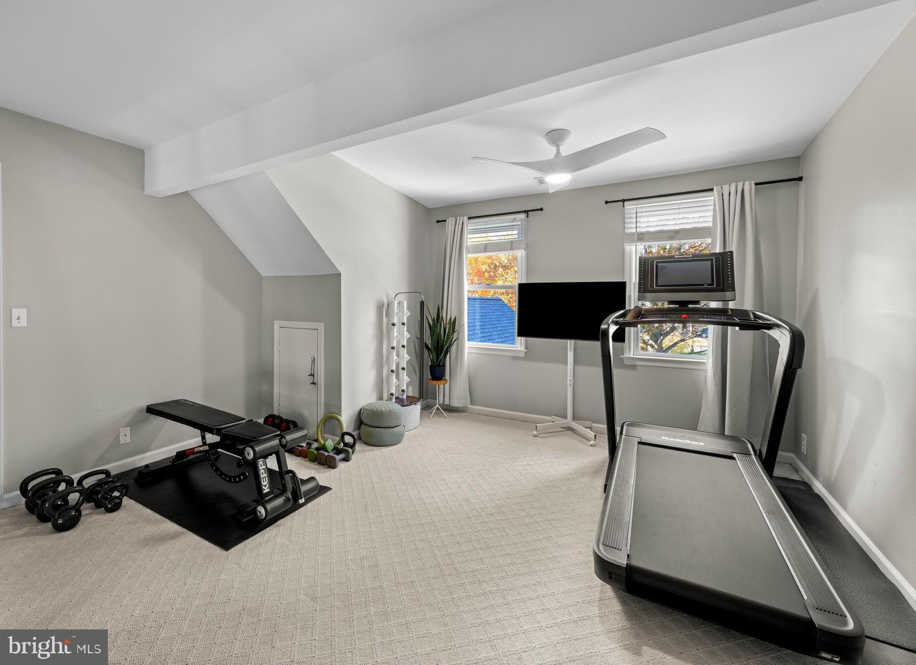 806 Monroe Manor Road Stevensville, MD 21619 - Photo 28 of 41 a room with gym equipment and a window