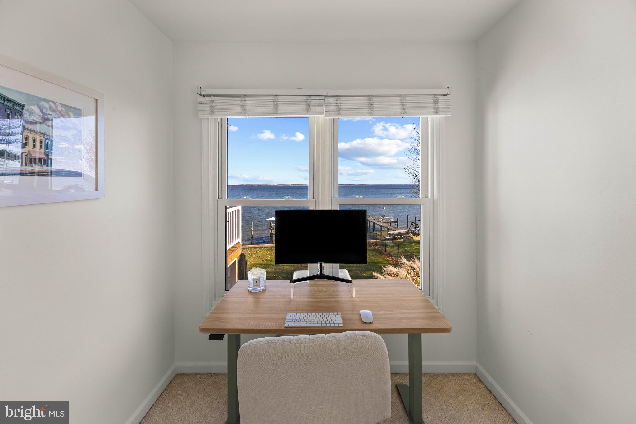 806 Monroe Manor Road Stevensville, MD 21619 - Photo 30 of 41 a view of a workspace with a table and chair