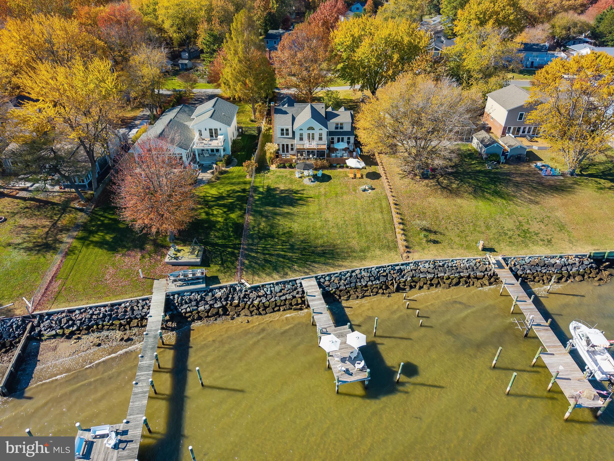 806 Monroe Manor Road Stevensville, MD 21619 - Photo 40 of 41 an aerial view of a house with a garden and lake view