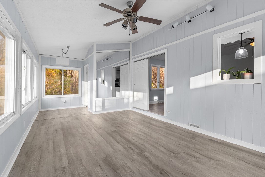 753 Webster Road Webster, NY 14580 - Photo 11 of 31 Bright family room/dining room space