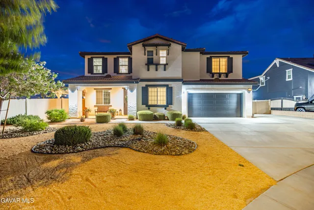 a front view of house with yard outdoor seating and barbeque oven