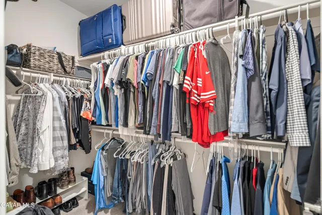 a view of a swimming pool with an outdoor seating