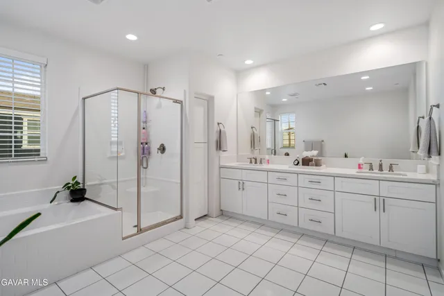 a view of swimming pool with a lounge chair