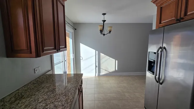 a view of empty room with a window