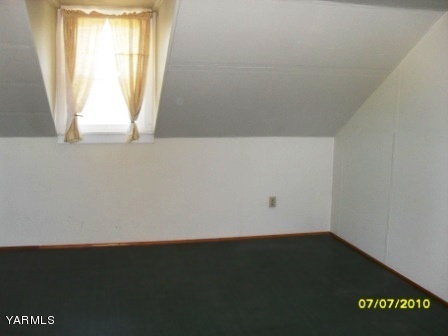 442 Hatton Road Tieton, WA 98947 - Photo 5 of 8 a view of an empty room and window