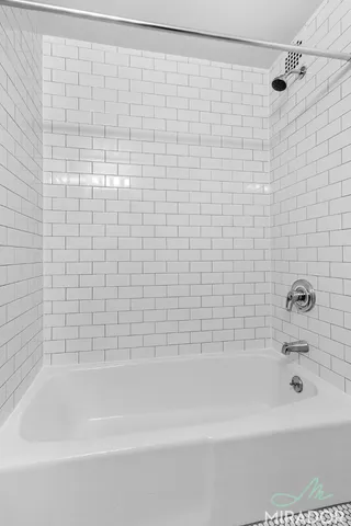 a bathroom with a bathtub