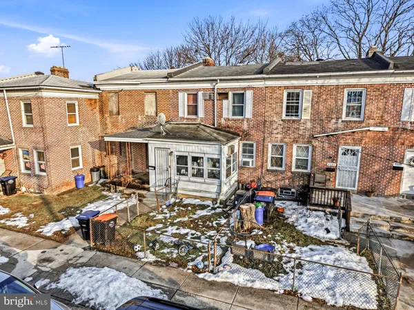 a front view of a building with many windows
