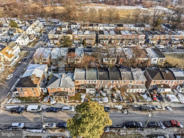 a front view of a building with many windows