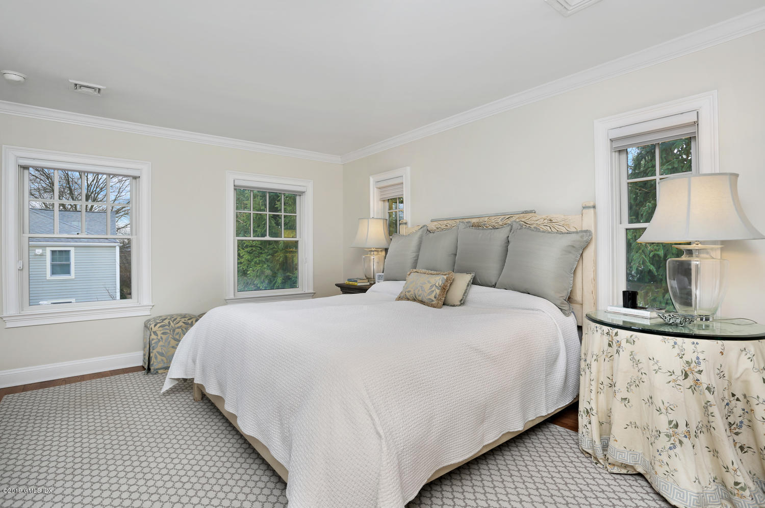 54 Valley Road, Unit A Cos Cob, CT 06807 - Photo 14 of 32 a bedroom with a large bed and a window