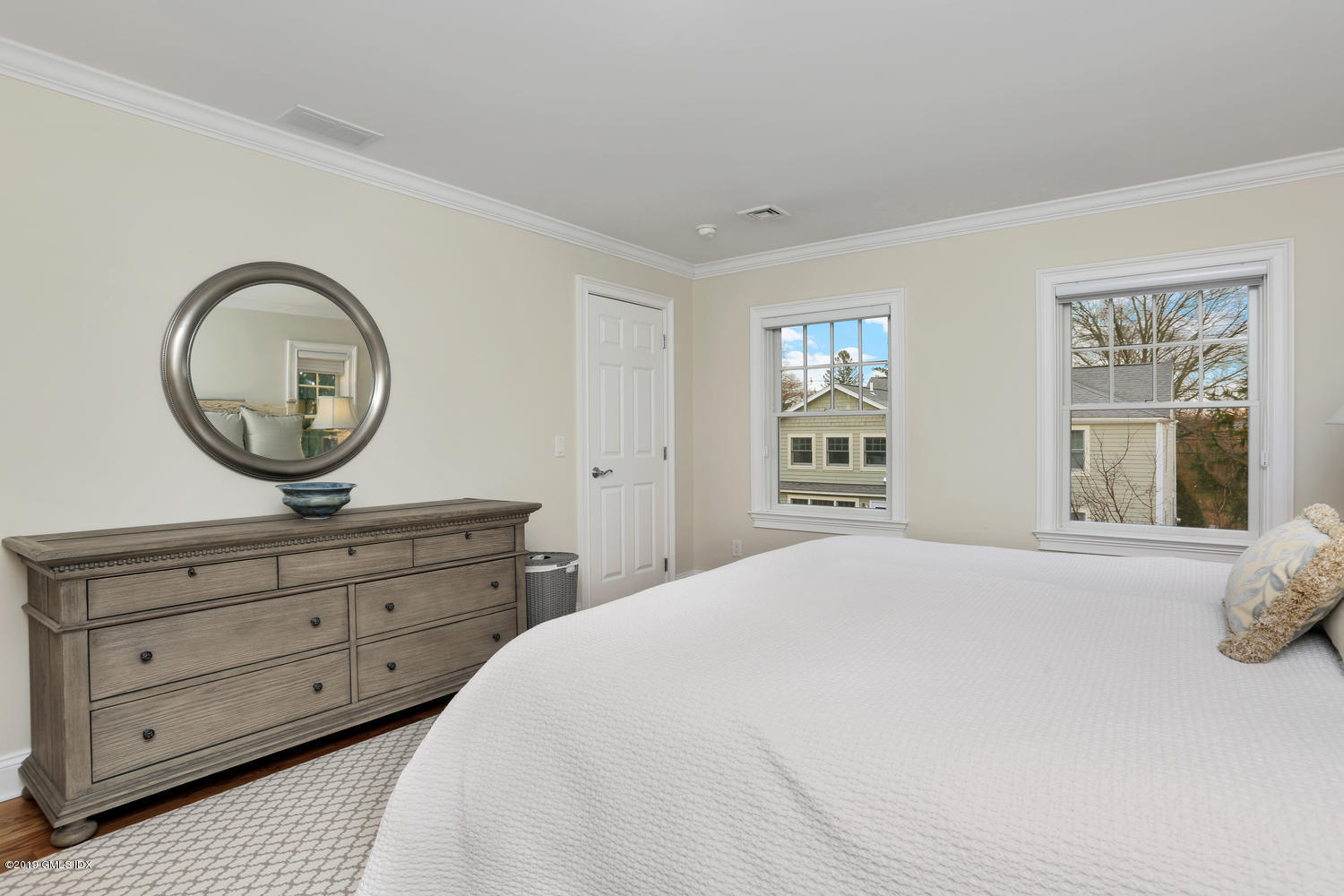 54 Valley Road, Unit A Cos Cob, CT 06807 - Photo 15 of 32 a bedroom with a bed and a window