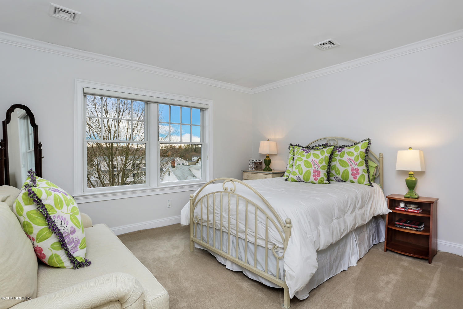 54 Valley Road, Unit A Cos Cob, CT 06807 - Photo 18 of 32 a bedroom with a bed and a couch