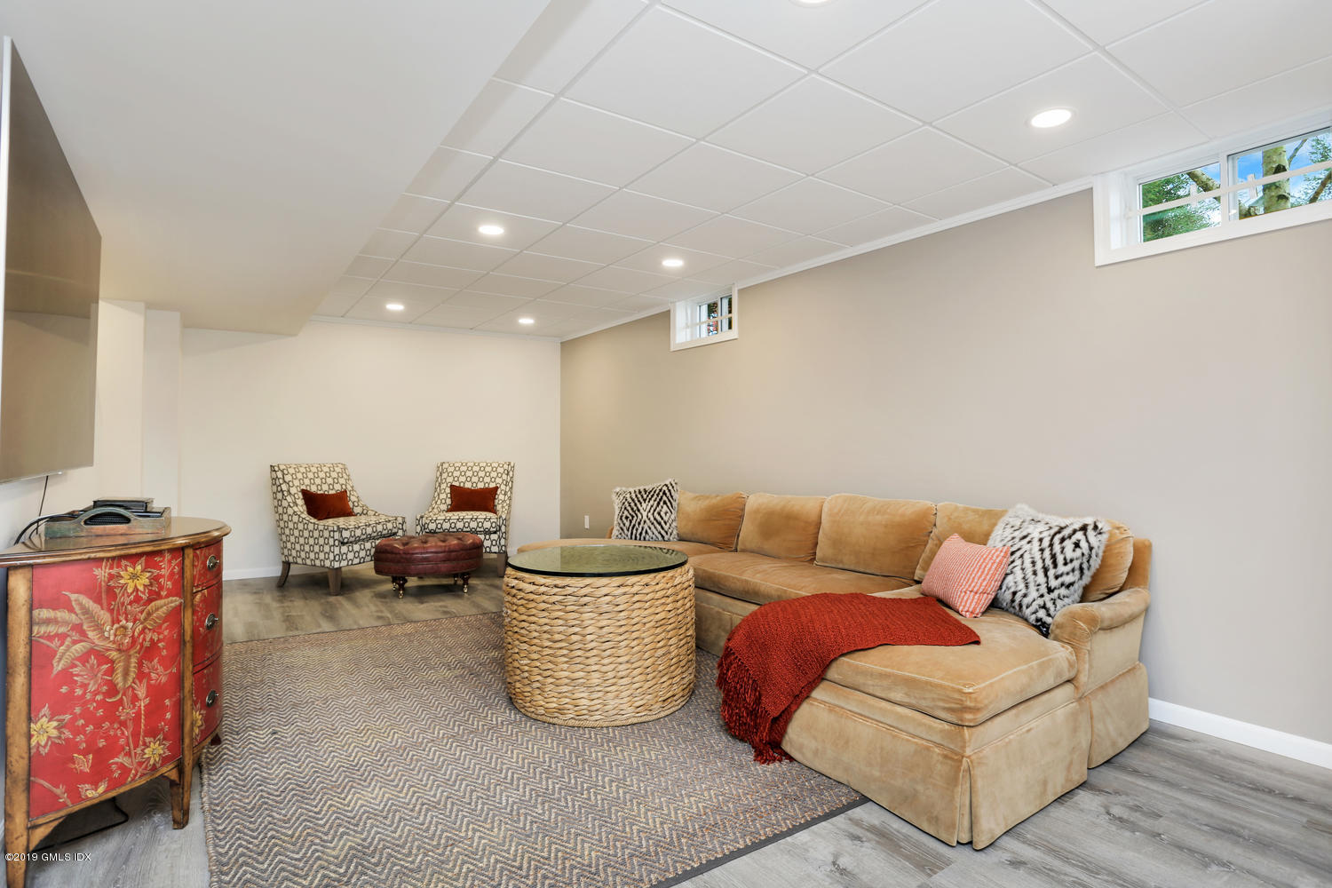 54 Valley Road, Unit A Cos Cob, CT 06807 - Photo 24 of 32 a living room with furniture and a couch