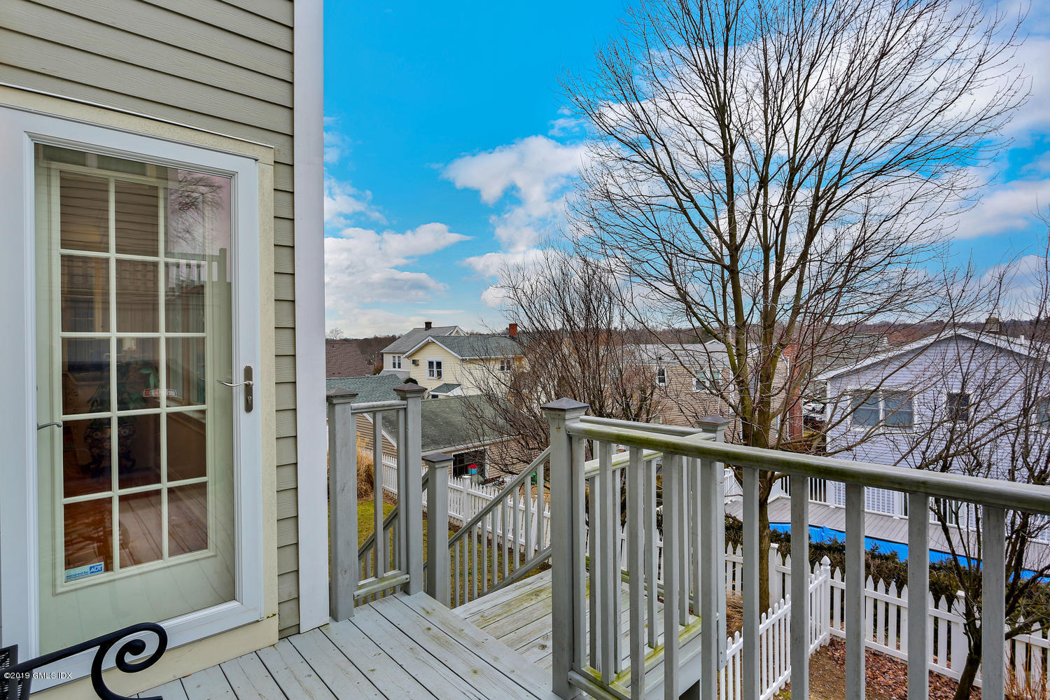 54 Valley Road, Unit A Cos Cob, CT 06807 - Photo 27 of 32 a view of balcony with wooden floor and fence