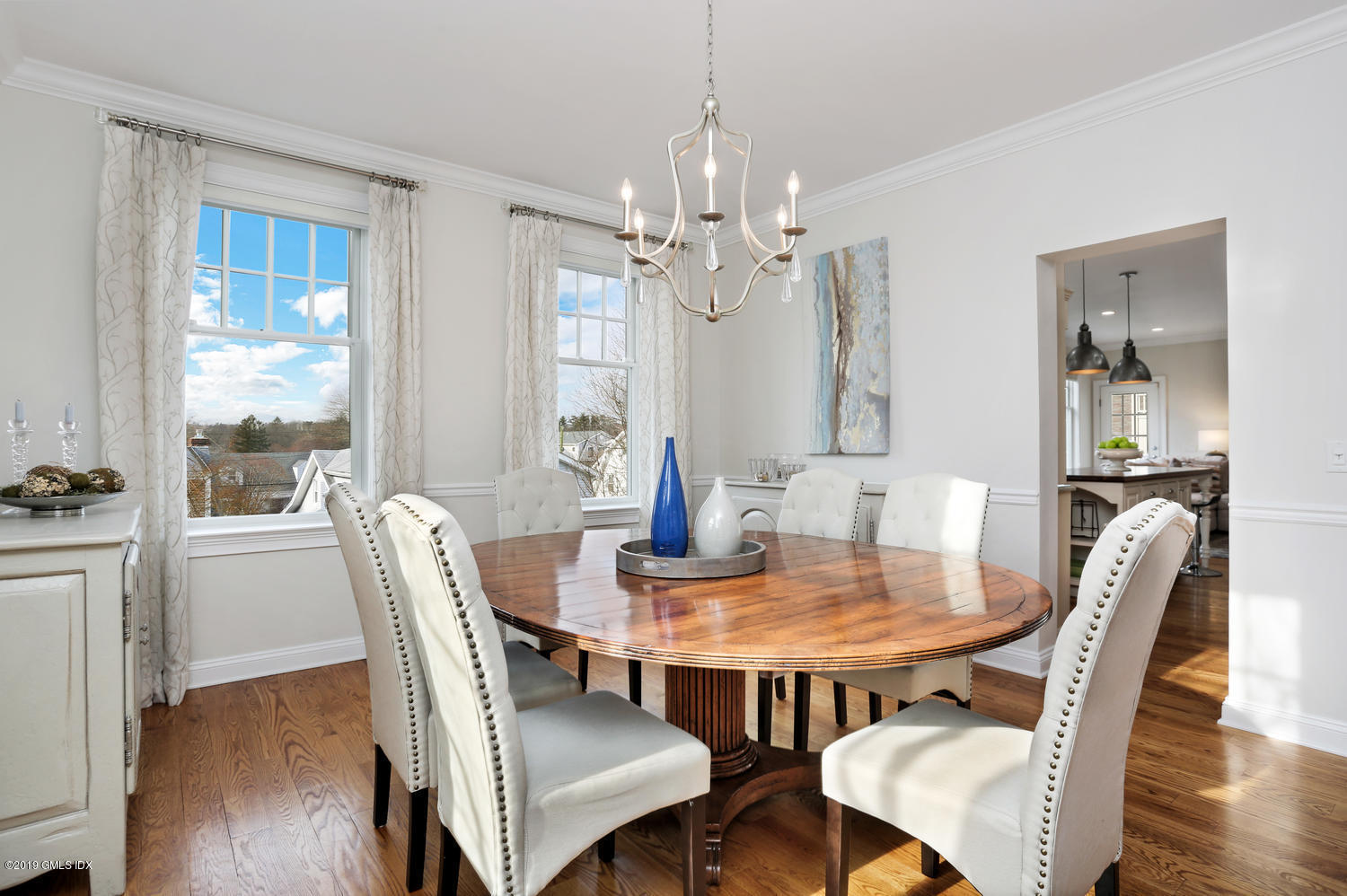 54 Valley Road, Unit A Cos Cob, CT 06807 - Photo 7 of 32 a view of a dining room with furniture window and wooden floor