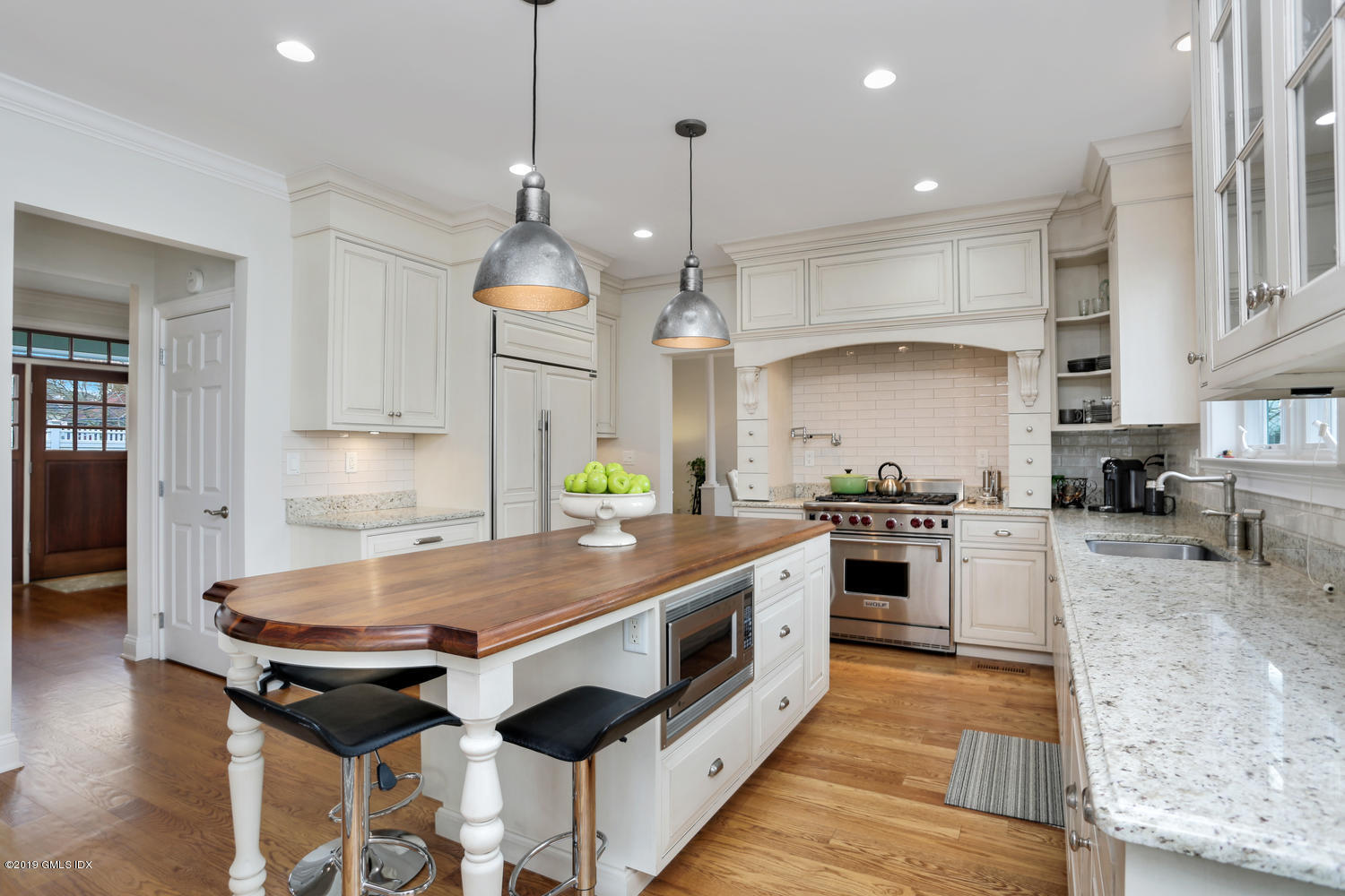 54 Valley Road, Unit A Cos Cob, CT 06807 - Photo 8 of 32 a large kitchen with stainless steel appliances granite countertop a stove a sink and a refrigerator