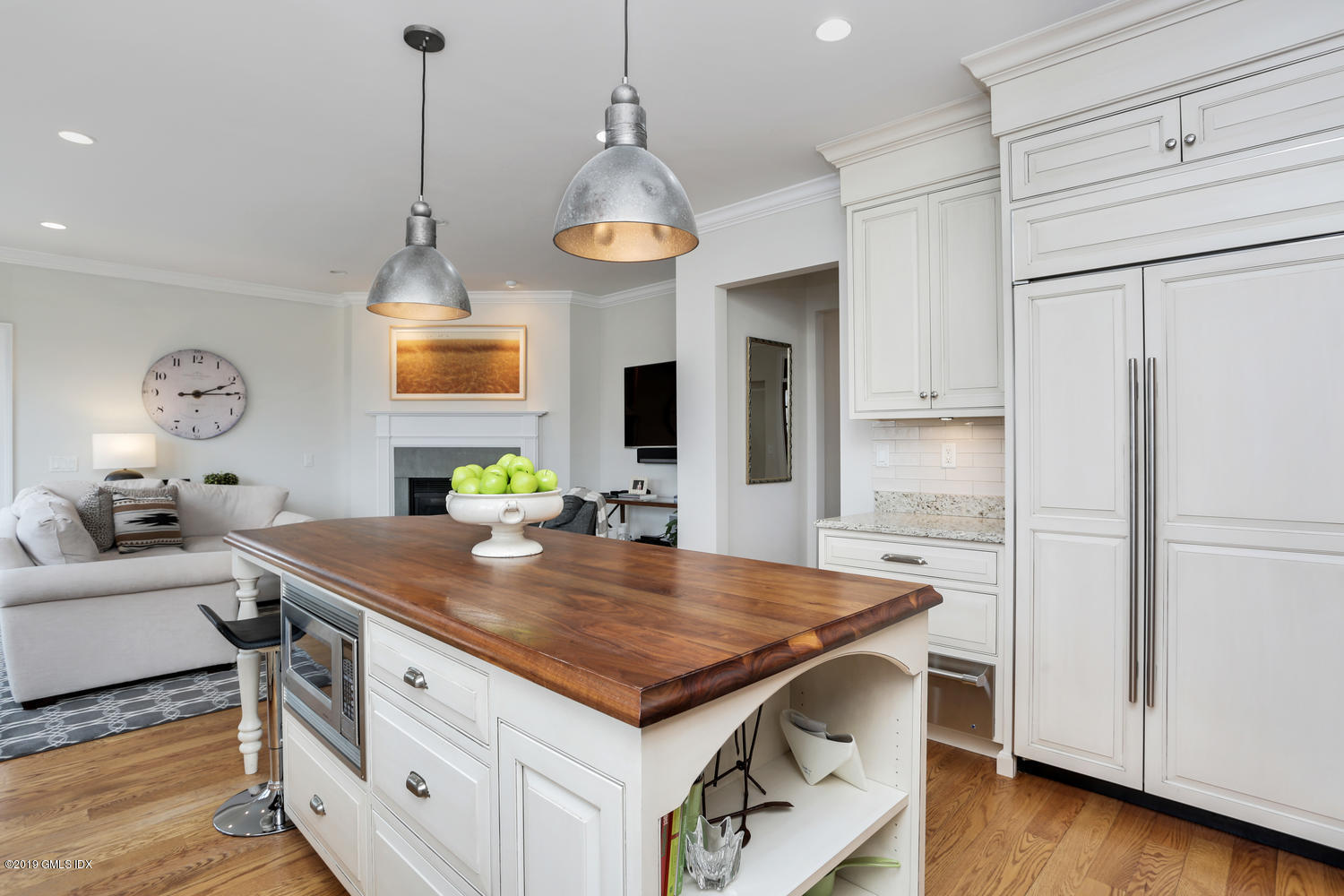 54 Valley Road, Unit A Cos Cob, CT 06807 - Photo 9 of 32 a kitchen with a counter space appliances and wooden floor