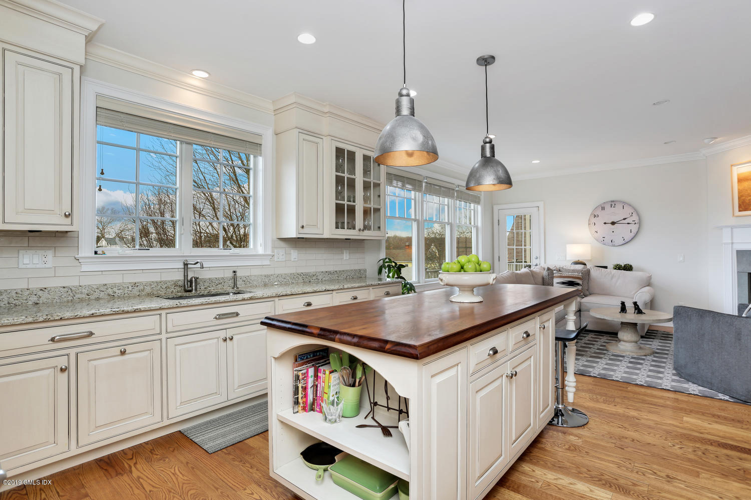 54 Valley Road, Unit A Cos Cob, CT 06807 - Photo 10 of 32 a kitchen with stainless steel appliances granite countertop a sink a stove and a wooden floors