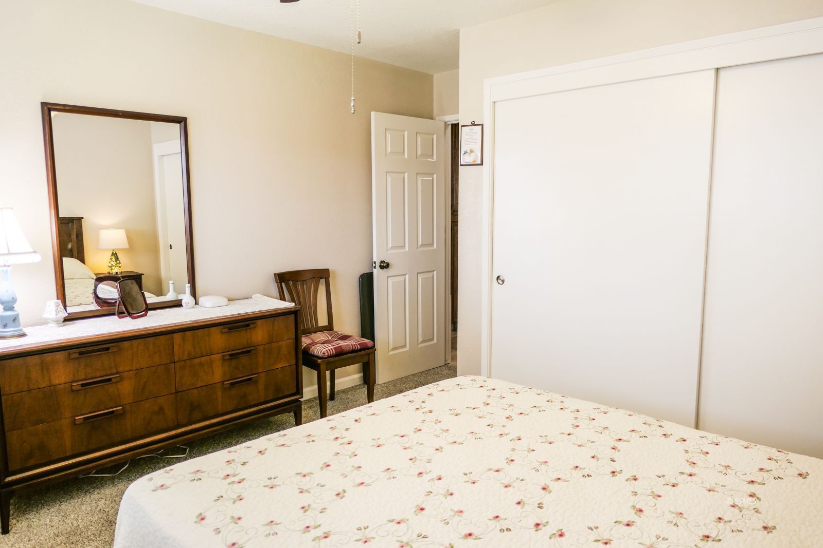 308 South Lilac Street Ridgecrest, CA 93555 - Photo 37 of 50 a bedroom with a bed and a dresser