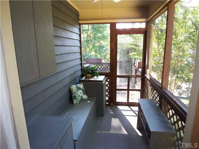 118 Timber Ridge Drive Durham, NC 27713 - Photo 10 of 12 The back porch is a lovely space where the previous owner loved to sip her morning coffee! Porch is actually set up with a small refrigerator and storage in wall cabinets and under bench seating! Other