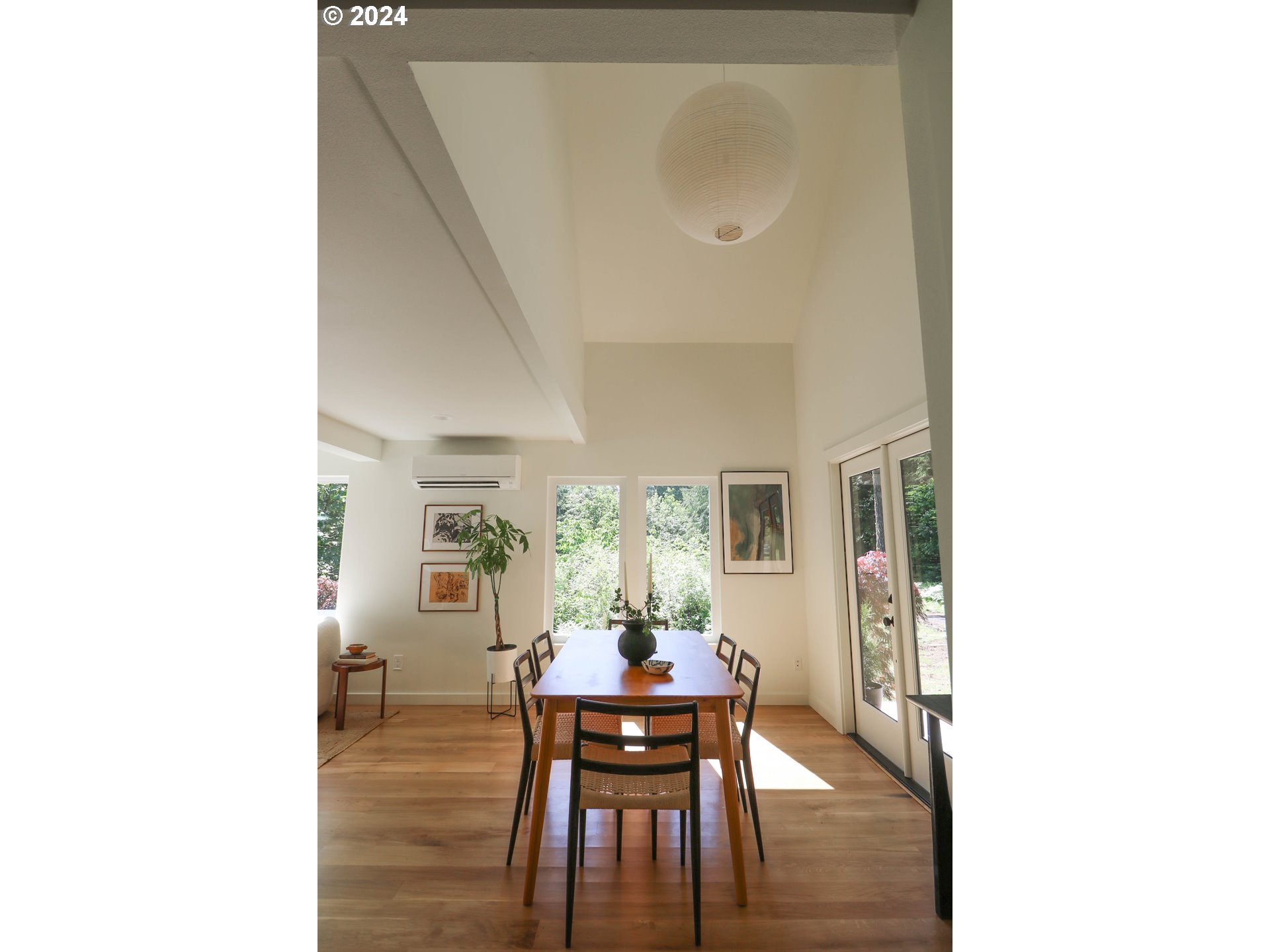 2162 Duncan Creek Road Stevenson, WA 98648 - Photo 12 of 38 a view of a dining room with furniture and wooden floor