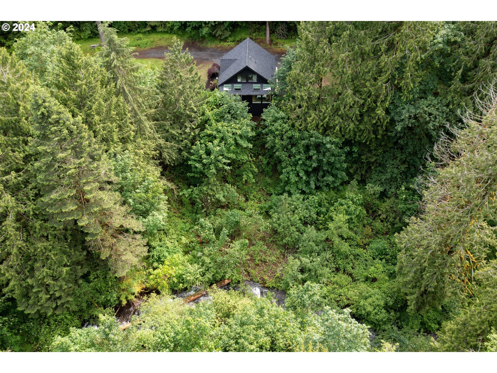 2162 Duncan Creek Road Stevenson, WA 98648 - Photo 2 of 38 a aerial view of a house with a yard