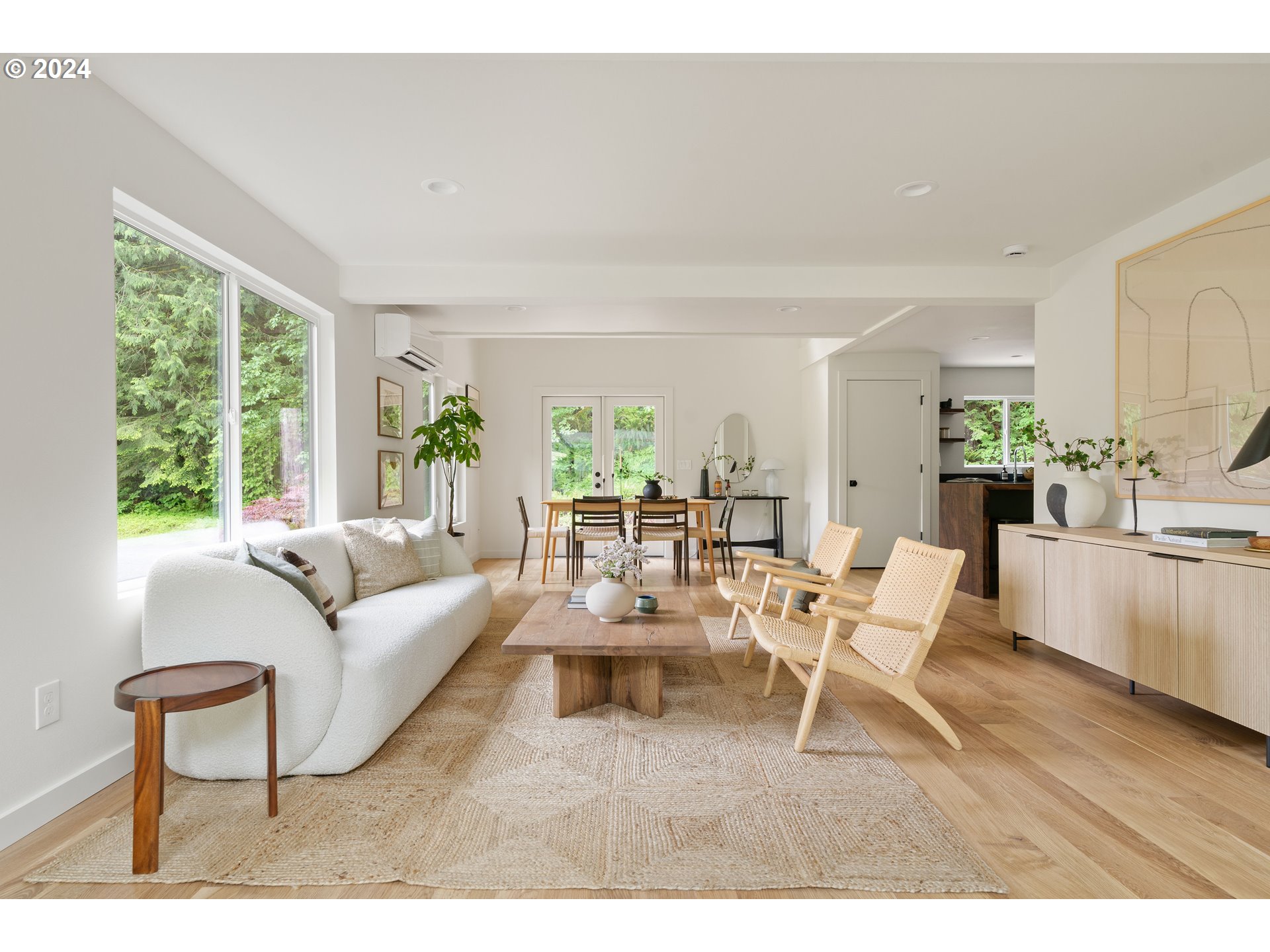 2162 Duncan Creek Road Stevenson, WA 98648 - Photo 10 of 38 a living room with furniture and a large window