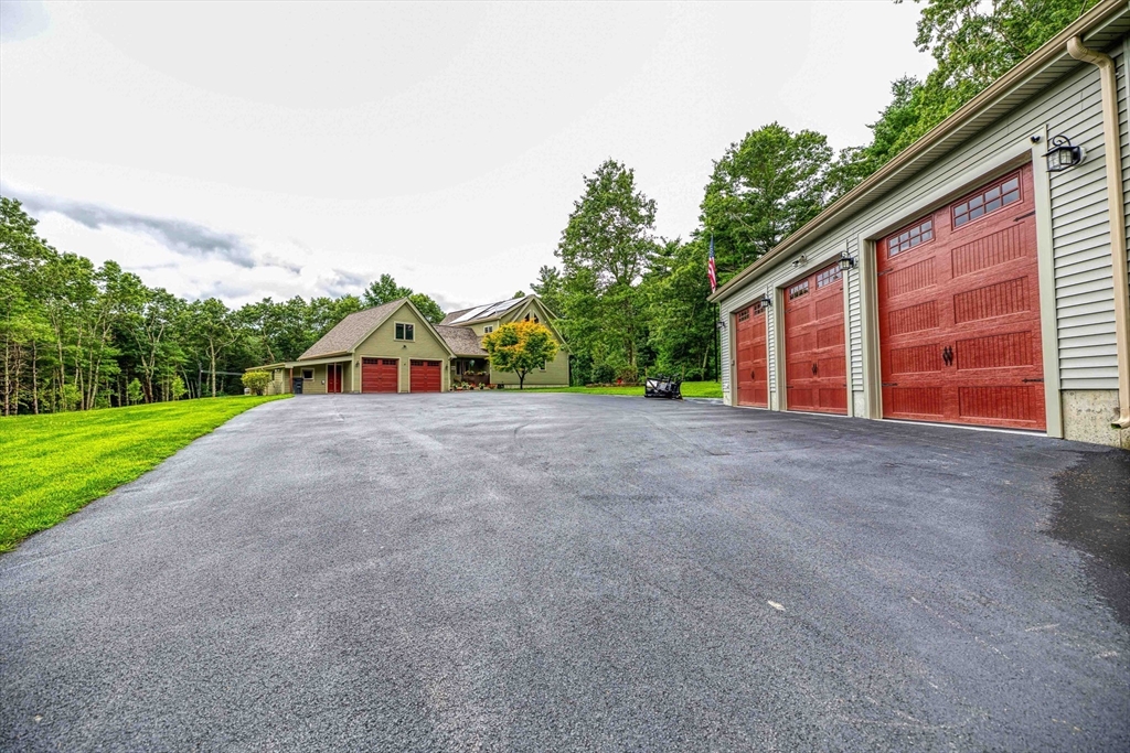 78 Howland Road Assonet, MA 02702 - Photo 2 of 41 a view of a house with a backyard